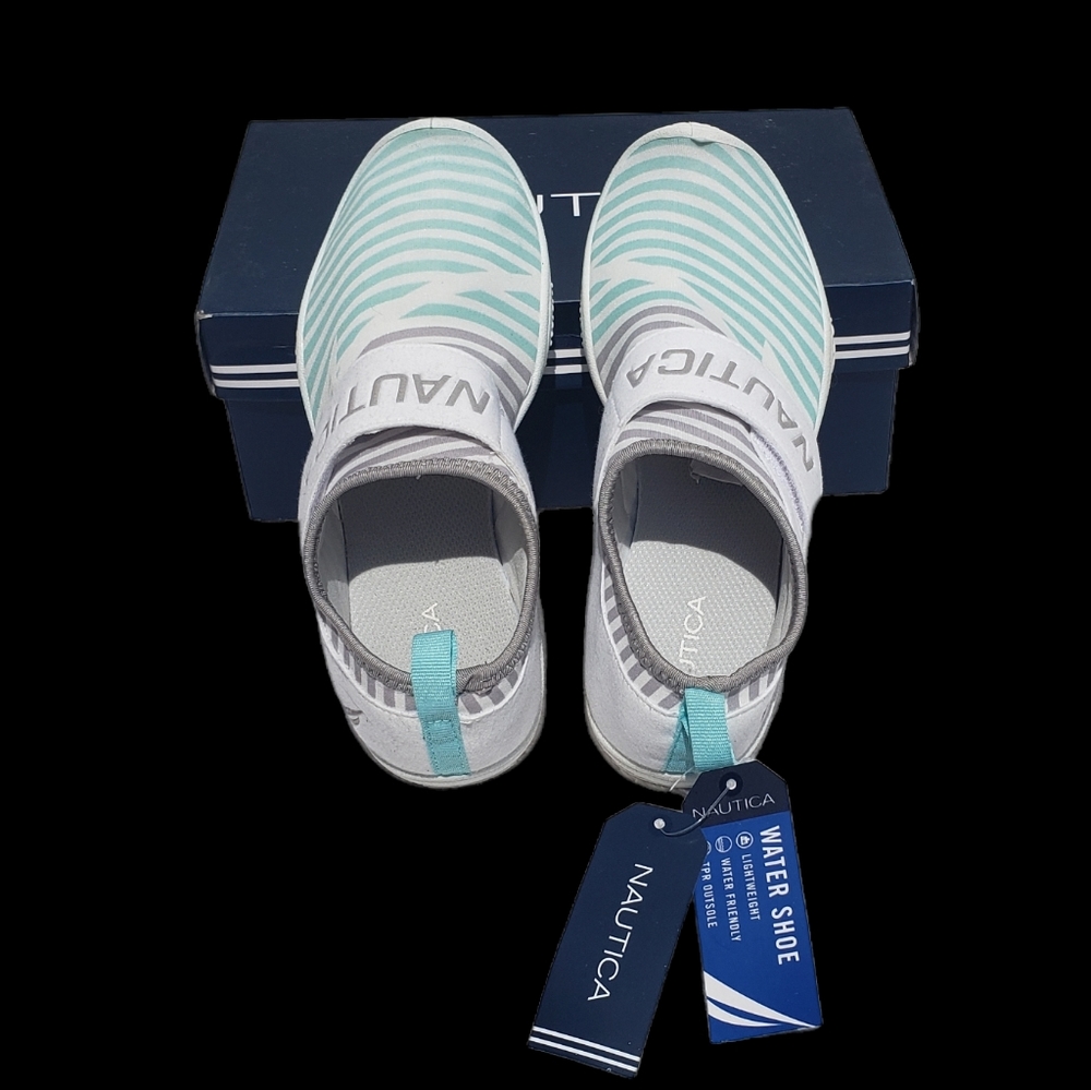 Nautical slip on Water Shoes. Only worn in store to try on.  New with tags!